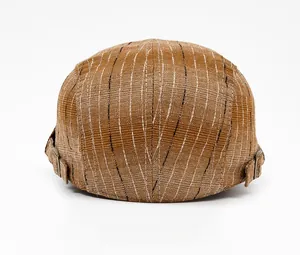 Detailed back view of striped brown newsboy cap showing metal adjustment buckles