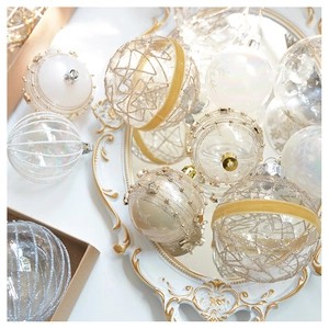 Detail showing champagne gold mesh Christmas balls with glitter and velvet textures