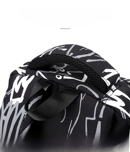 Macro view of padded mesh handle on black and white graffiti printed backpack