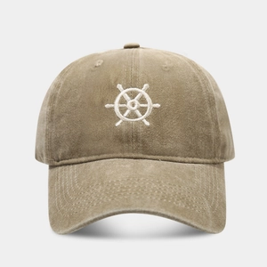 Close-up of vintage washed cotton baseball cap featuring white helm embroidery details