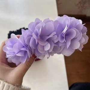 Detailed view of the purple multi-layered chiffon flower headband for women hair accessory