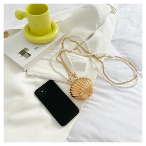 Chic shell-shaped gold metal bag with pearl chain strap and long metal snake chain