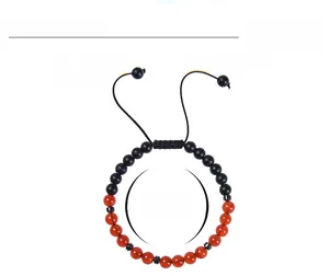 Detail of 6mm red agate morse code bracelet showing adjustable 6.6-11.8 inch braided cord
