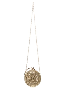 Detailed macro of a round champagne gold evening bag with rhinestones and metal handle