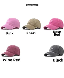 Detail showing five colors of washed cotton baseball caps with heart embroidery