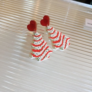 Festive Christmas tree earrings with red glitter hearts and white tree pendants