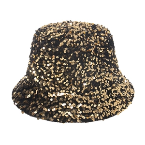 Close-up of golden sequins on a leopard pattern bucket hat with high density metallic texture