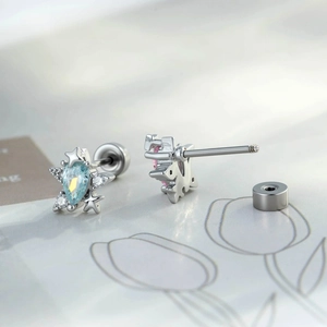 Chic star-shaped oval zircon ear studs with light blue teardrop stones and flat back screw