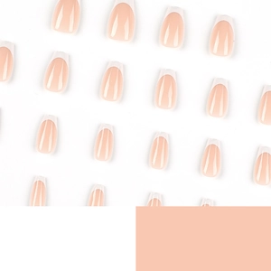 Short coffin French press-on nails with nude base and white tips in a minimalist set
