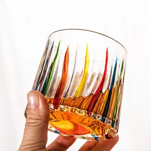 Colorful spiral textured whiskey glass with thick base and creative rotatable design
