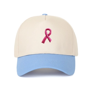 Zweifarbige Trucker-Mütze mit rosa Schleifen-Stickerei auf Creme und Hellblau