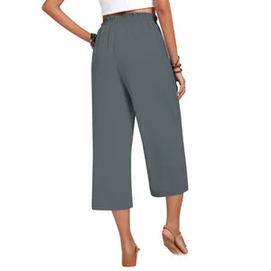 Detail of high-waist dark grey linen culottes with elastic waistband and back view fit