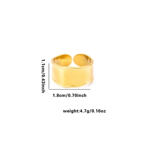 Detailed view of gold plated titanium steel ring with wave texture and dimension markings