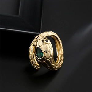18K gold plated snake ring featuring a green gemstone head and sparkling cubic zirconia tail
