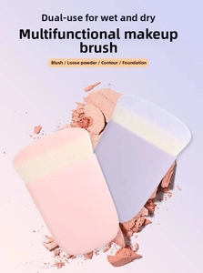 Macro view of wide flat makeup brush with gradient bristles for foundation and powder