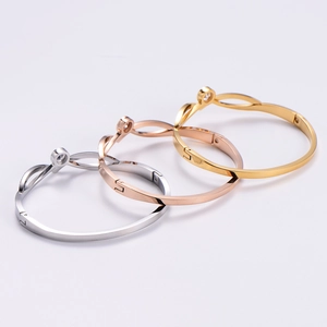 Three-color titanium steel knot bracelets set in gold, rose gold and silver with zircon