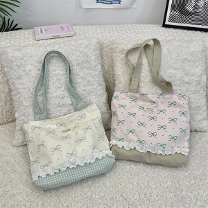 Detail of floral lace edge and plaid patchwork on sweet canvas tote bag for women