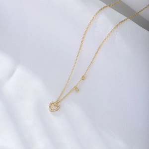 Elegant gold S925 sterling silver hollow heart necklace with sparkling zircon crystals