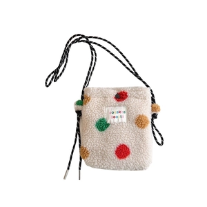 Cute off-white plush shoulder bag with colorful polka dots and drawstring closure