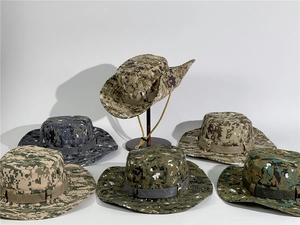 Detail of digital camouflage sun hats with breathable eyelets and adjustable chin straps