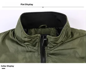 Détail d'une veste vert armée avec col montant côtelé noir et fermeture éclair en métal