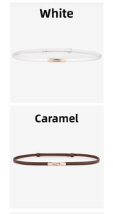 Detail of slim leather waist belts in white and caramel colors with gold buckles