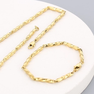 Golden Mobius stainless steel necklace and bracelet set with spiral twist chain design