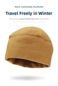 Detailed close-up of camel fleece winter hat featuring reinforced stitching and warm fabric