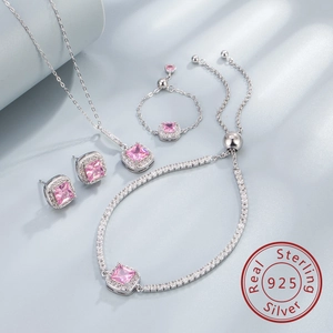 Macro detail of S925 sterling silver stamp and pink zircon stone jewelry set