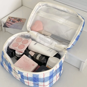 Retro blue and white checkered quilted cosmetic bag with red stitching and high capacity