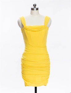 Detailed view of the yellow slim-fit slip dress with ruched texture on a white background
