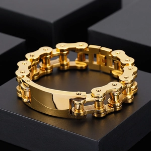 Detailed view of heavy gold-tone stainless steel bicycle chain bracelet for men