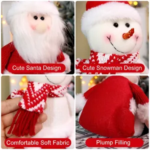 Gestrickte Weihnachtsfiguren Weihnachtsmann und Schneemann in rot-weißer Sitzposition
