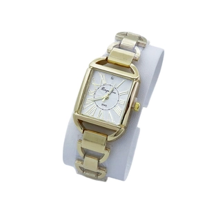 Montre à quartz dorée pour femme avec chiffres romains et bracelet en chaîne en forme de U