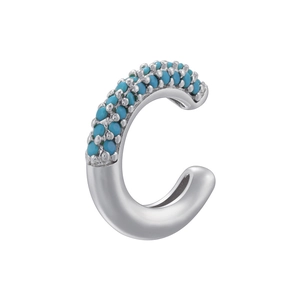 Detailed close-up of C-shaped ear cuff with turquoise stones on silver base