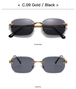 Detail view of gold rimless sunglasses with gradient lenses and rhinestone accents