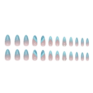 Almond-shaped blue glitter gradient press-on nails with rhinestones and pearls