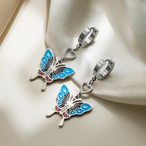 Silver titanium steel butterfly drop earrings with blue and red enamel on beige silk