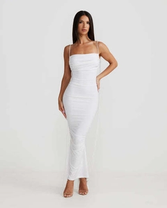 Close-up detail of white bodycon maxi dress featuring slim spaghetti straps and soft fabric