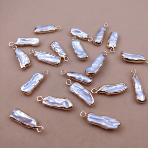 Baroque teardrop pearls with gold plating and hanging loops for DIY jewelry making