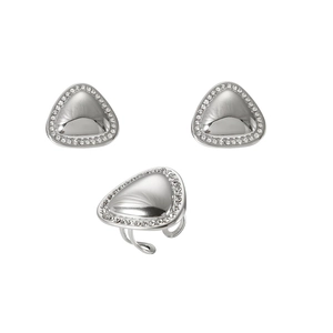 Macro detail of silver triangle jewelry set with crystal inlay and adjustable ring band
