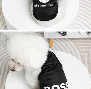 Detail of a black summer pet vest featuring white BOSS typography for small dogs