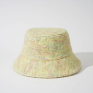 Colorful knit bucket hat in pastel yellow pink and green with fuzzy textured finish