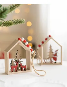 Detail of wooden Nordic Christmas house ornaments with reindeer, Santa, and beads