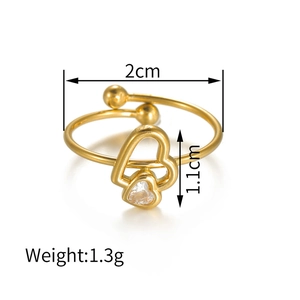 Detail view of gold stainless steel double heart ring with CZ inlay and 2cm inner diameter