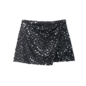 Chic black sequin mini skirt with silver sparkles in a stylish bodycon wrap design