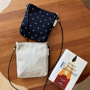 Minimalist striped denim and linen crossbody bag in polka dot and oatmeal colors