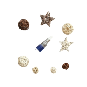 Hyaluronic acid moisturizing serum 30ml in blue bottle with rattan ball decor