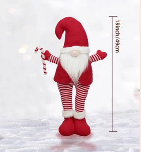 Detail view of 19 inch tall red knitted Christmas gnome with 49cm height measurement