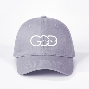 Adjustable light grey baseball cap with God Is Good white print and curved brim